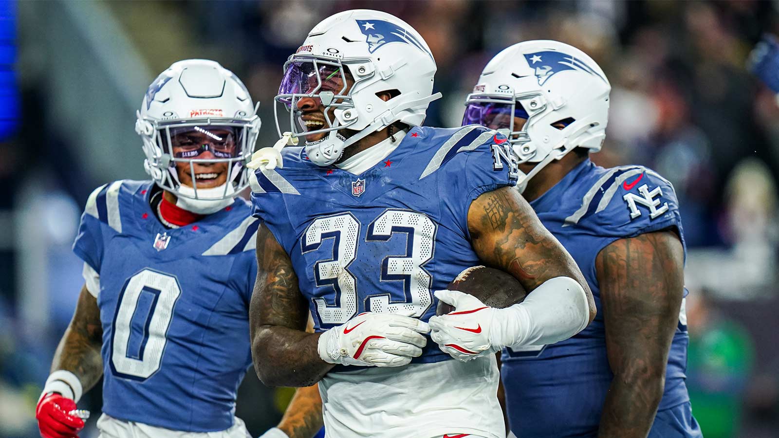 New England Patriots linebacker Anfernee Jennings (33) retrieves the ball after a bad snap by the New York Jets in the fourth quarter at Gillette Stadium.