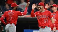 Los Angeles Angels center fielder Joe Adell (7) and designated hitter Mike Trout (27) celebrate after the Angels beat the Cleveland Guardians at Progressive Field.