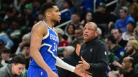 Milwaukee Bucks forward Giannis Antetokounmpo (34) walks past head coach Doc Rivers in the third quarter against the Oklahoma City Thunder at Fiserv Forum.