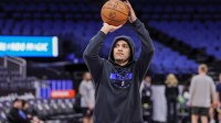 Orlando Magic guard Anthony Black (0) warms up before the game against the Denver Nuggets at Kia Center.