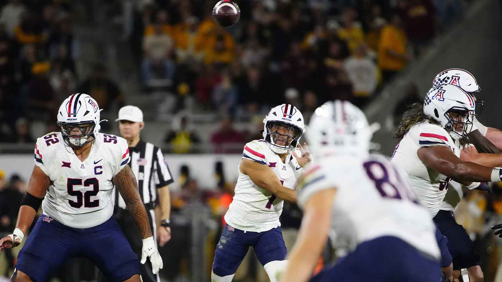 Arizona quarterback Noah Fifita (1) throws a pass against Arizona State during a game at Mountain America Stadium in Tempe on Nov. 28, 2025.