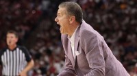 Arkansas Razorbacks head coach John Calipari reacts to a call in the second half of the game against the Tennessee Volunteers at Bud Walton Arena.