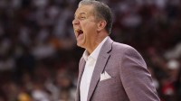 Arkansas Razorbacks head coach John Calipari reacts to a call in the second half of the game against the Tennessee Volunteers at Bud Walton Arena.