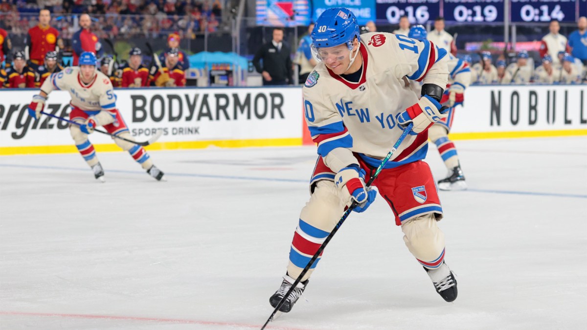 New York Rangers left wing Artemi Panarin (10) controls the puck against the Florida Panthers during the first period in the 2026 Winter Classic ice hockey game at loanDepot Park.