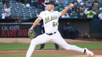 Oakland Athletics starting pitcher Ken Waldichuk (64) pitches the ball against the Detroit Tigers during the first inning at Oakland-Alameda County Coliseum.