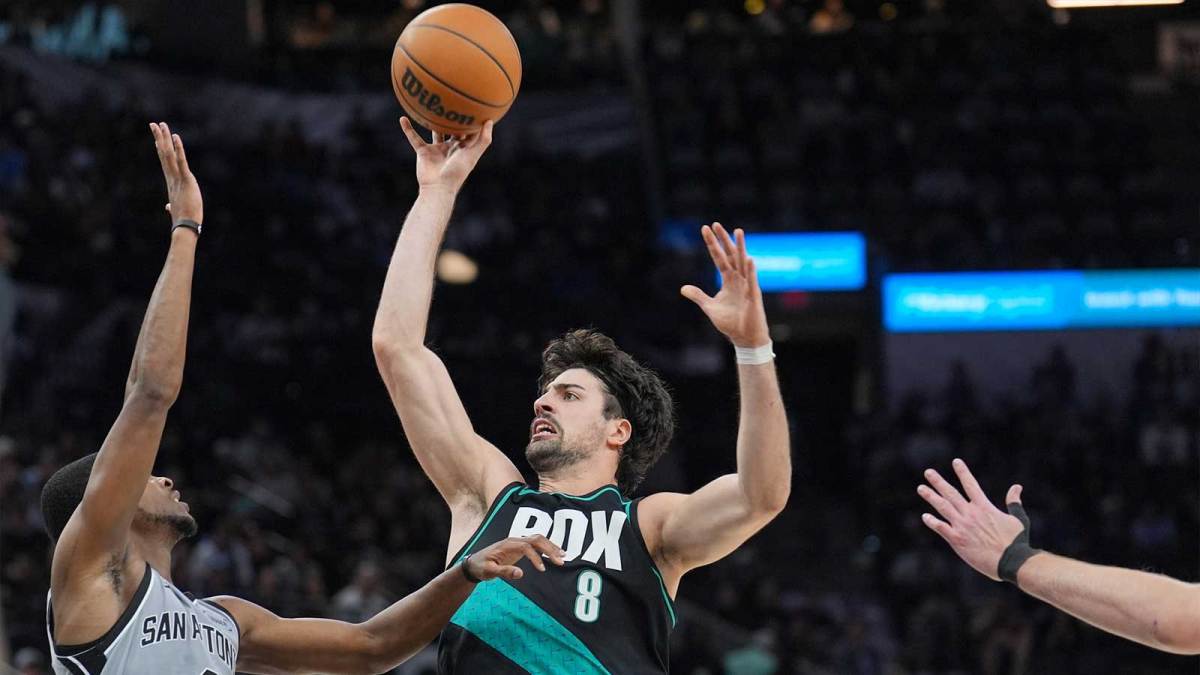 Portland Trail Blazers forward Deni Avdija (8) shoots over San Antonio Spurs guard De'aaron Fox (4) in the second half at Frost Bank Center.