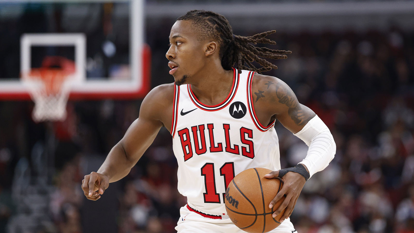 Check out Ayo Dosunmu’s shirt featuring Bears WR DJ Moore TD vs. Packers