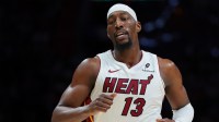 Miami Heat center Bam Adebayo (13) looks on against the Denver Nuggets during the second quarter at Kaseya Center.