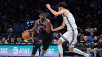 Miami Heat center Bam Adebayo (13) drives to the basket against Oklahoma City Thunder center Chet Holmgren (7) during the third quarter at Kaseya Center.