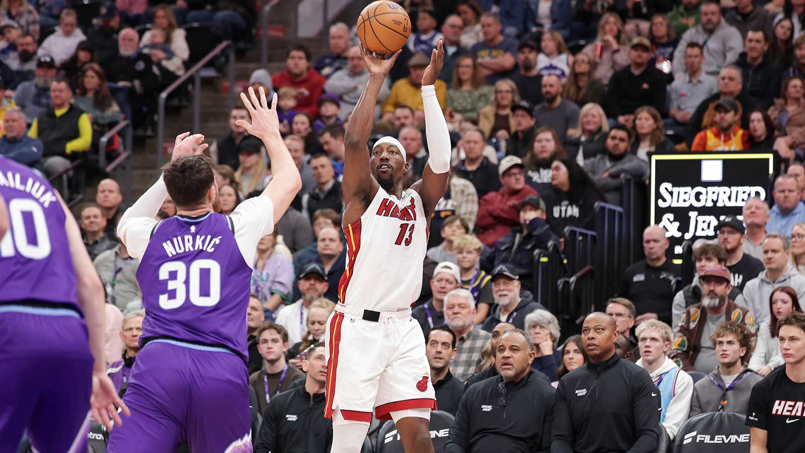 Miami Heat center/forward Bam Adebayo (13) shoots an open jump shot against the Utah Jazz during the first quarter at Delta Center.