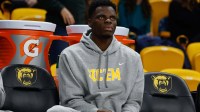 Baylor Bears center James Nnaji (46) in street clothes on the bench during the second half against the Arlington Baptist Patriots at Paul and Alejandra Foster Pavilion.