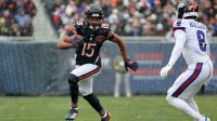 Chicago Bears wide receiver Rome Odunze (15) makes a catch against New York Giants safety Jevon Holland (8) during the first half at Soldier Field.