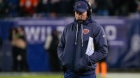 Chicago Bears head coach Ben Johnson stands on the sidelines against the Green Bay Packers during the first half of an NFC Wild Card Round game at Soldier Field.