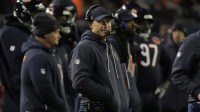 Chicago Bears head coach Ben Johnson stands on the sidelines against the Green Bay Packers during the second half of an NFC Wild Card Round game at Soldier Field.