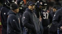 Chicago Bears head coach Ben Johnson stands on the sidelines against the Green Bay Packers during the second half of an NFC Wild Card Round game at Soldier Field.
