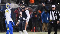 Chicago Bears quarterback Caleb Williams (18) reacts to a first down against the Los Angeles Rams during the fourth quarter of an NFC Divisional Round game at Soldier Field.