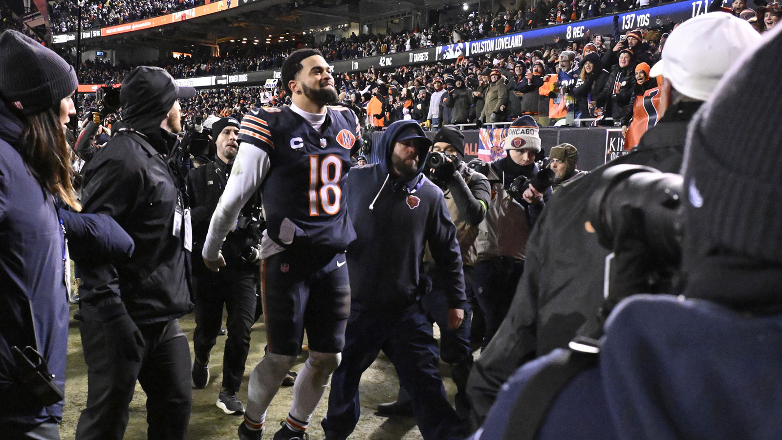 Chicago Bears quarterback Caleb Williams (18) leaves the field following a game against the Green Bay Packers in an NFC Wild Card Round game at Soldier Field.