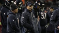 Chicago Bears head coach Ben Johnson stands on the sidelines against the Green Bay Packers during the second half of an NFC Wild Card Round game at Soldier Field.