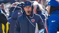 Chicago Bears head coach Ben Johnson walks along the sideline during the first quarter against the Cleveland Browns at Soldier Field.