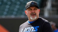 Detroit Lions offensive coordinator John Morton walks on the field for warmup ahead of Cincinnati Bengals game at Paycor Stadium in Cincinnati