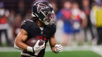 Atlanta Falcons running back Bijan Robinson (7) runs the ball against the New Orleans Saints in the third quarter at Mercedes-Benz Stadium