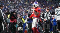 Buffalo Bills wide receiver Tyrell Shavers (14) reacts after catching a thirty-two yard pass thrown by quarterback Josh Allen (not pictured) against the Philadelphia Eagles during the third quarter at Highmark Stadium.