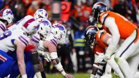 The Buffalo Bills line up against the Denver Broncos during overtime of an AFC Divisional Round playoff game at Empower Field at Mile High.