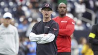 Houston Texans offensive coordinator Bobby Slowik and head coach DeMeco Ryans look on before the game against the Los Angeles Chargers in an AFC wild card game at NRG Stadium.