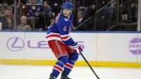 New York Rangers defenseman Braden Schneider (4) skates with the puck against the Utah Mammoth during the third period at Madison Square Garden.