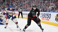 Edmonton Oilers center Leon Draisaitl (29) and Seattle Kraken defenseman Brandon Montour (62) are seen out on the ice as the Edmonton Oilers take on the Seattle Kraken during the second period at Rogers Place.