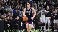 UConn Huskies guard Braylon Mullins (24) dribbles the ball against the Providence Friars during the second half at Amica Mutual Pavilion.
