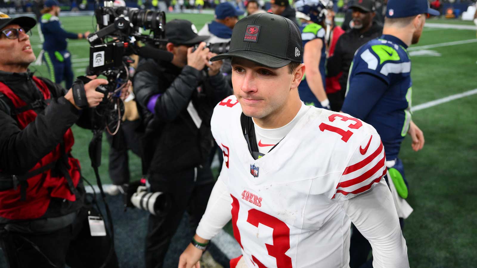 San Francisco 49ers quarterback Brock Purdy (13) leaves the field following an NFC Divisional Round game against the Seattle Seahawks at Lumen Field.