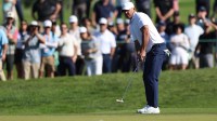 Brooks Koepka putts on the tenth green during the second round of the Farmers Insurance Open golf tournament at Torrey Pines Municipal Golf Course - South Course.