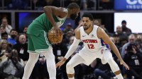 Detroit Pistons forward Tobias Harris (12) defends against Boston Celtics guard Jaylen Brown (7) in the second half at Little Caesars Arena.
