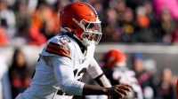 Cleveland Browns quarterback Shedeur Sanders (12) scrambles in the first quarter of the NFL Week 18 game between the Cincinnati Bengals and the Cleveland Browns.