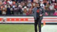 Cleveland Browns head coach Kevin Stefanski paces the sideline during the first half of an NFL football game against the Tennessee Titans at Huntington Bank Field