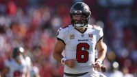 Tampa Bay Buccaneers quarterback Baker Mayfield (6) runs on the field during the first half against the San Francisco 49ers at Raymond James Stadium.