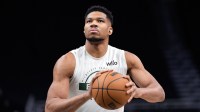 Bucks forward Giannis Antetokounmpo (34) shoots during warmups prior to the game against the Washington Wizards at Fiserv Forum