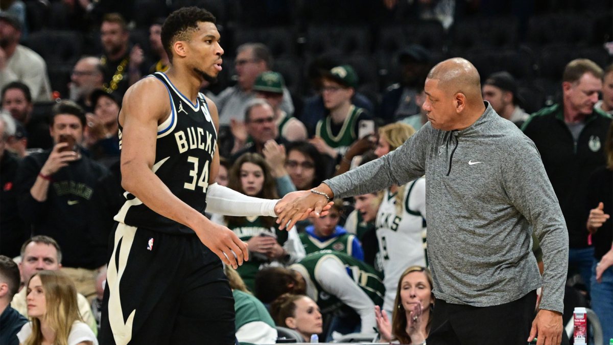 Bucks forward Giannis Antetokounmpo (34) exits the game in the fourth quarter as head coach Doc Rivers shakes his hand during game four against the Indiana Pacers of first round for the 2024 NBA Playoffs at Fiserv Forum