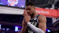 Bucks forward Giannis Antetokounmpo (34) pauses before the start of a game against the New York Knicks at Madison Square Garden