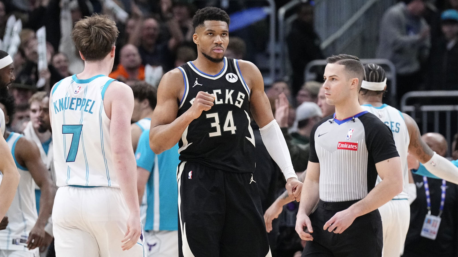 Bucks forward Giannis Antetokounmpo (34) celebrates a 122-121 win over the Charlotte Hornets at Fiserv Forum