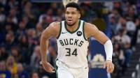 Milwaukee Bucks forward Giannis Antetokounmpo (34) runs back on defense against the Golden State Warriors during the second quarter at Chase Center.
