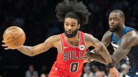 Chicago Bulls guard Coby White (0) dribbles the ball against the Minnesota Timberwolves in the second half at Target Center.