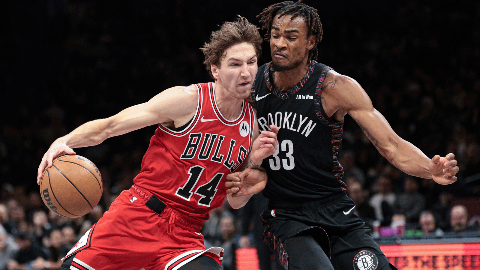 Chicago Bulls forward Matas Buzelis (14) drives to the basket against Brooklyn Nets center Nic Claxton (33) during the second half at Barclays Center.
