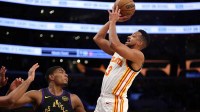 Atlanta Hawks guard CJ McCollum (3) shoots the ball against Los Angeles Lakers forward Rui Hachimura (28) during the first half at Crypto.com Arena.