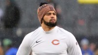 Chicago Bears quarterback Caleb Williams (18) looks on during warmups before an NFC Divisional Round game against the Los Angeles Rams at Soldier Field.