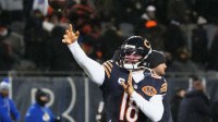 Chicago Bears quarterback Caleb Williams (18) throws a pass during warmups before an NFC Divisional Round game against the Los Angeles Rams at Soldier Field. Mandatory Credit: David Banks-Imagn Images