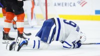 Toronto Maple Leafs center Calle Jarnkrok (19) reacts after an injury against the Philadelphia Flyers in the first period at Xfinity Mobile Arena.
