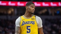 Los Angeles Lakers forward Cam Reddish (5) enters the court after a timeout in the second quarter against the Minnesota Timberwolves at Target Center.