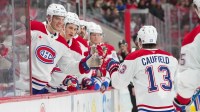 Montréal Canadiens right wing Cole Caufield (13) celebrates his goal against the Carolina Hurricanes during the second period at Lenovo Center.